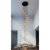 Designerska lampa sufitowa na okrągłej podstawie z małymi kloszami
