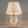 Elegancka lampka stołowa z okrągłą, szklaną, przezroczystą podstawą