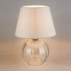Elegancka lampka stołowa z okrągłą, szklaną, przezroczystą podstawą