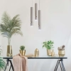 Beżowa lampa wisząca, trzy tuby zwisające z okrągłej podsufitki, GU10