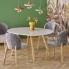 Lampa wisząca w kolorze zielonym z odsłoniętą żarówką