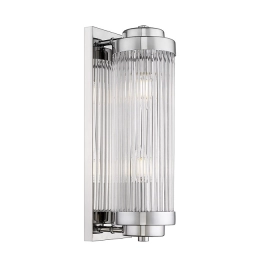 Cylindryczna, chromowana lampa ścienna idealna do nowoczesnej łazienki