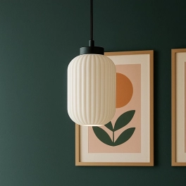 Biało-czarna lampa wisząca z jednym kloszem nad wyspę kuchenną