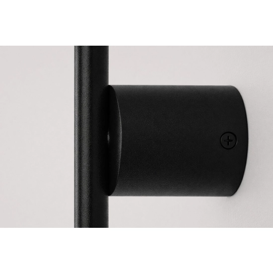 Dekoracyjny, czarny kinkiet ścienny, idealny do każdego wnętrza