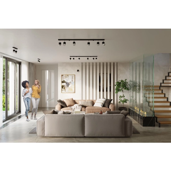 Minimalistyczny, czarny kinkiet w kształcie reflektorka na przegubie