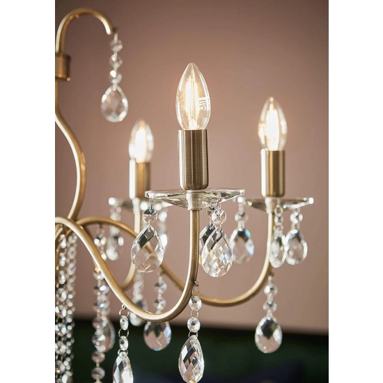 Elegancka, złota lampa wisząca typu świecznik, z kryształkami, do salonu