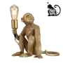 Efektowna, złota lampka do salonu, lampa w kształcie małpy